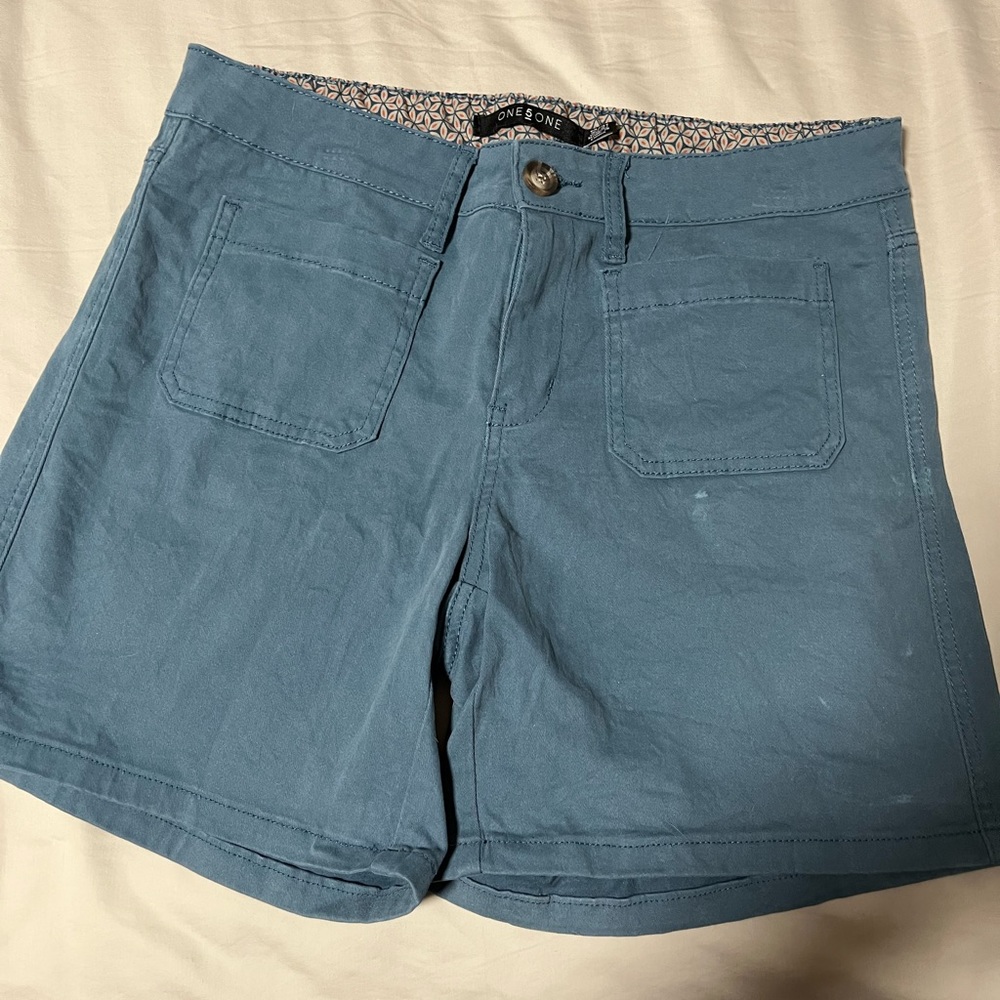 Dusty gray Blue shorts. 5” inseam size 12
